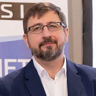 Николай